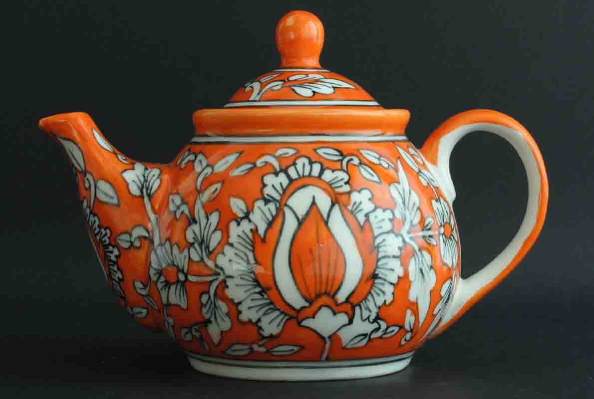 https://taooftea.com/wp-content/uploads/2021/01/orange-bloom-morning-teapot-sl-1.jpg